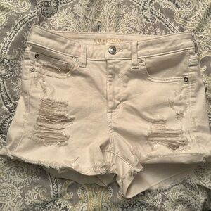 White ripped Jean shorts